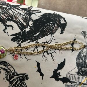 Betsey Johnson Gold Necklace with Pink Floral Charm and skull